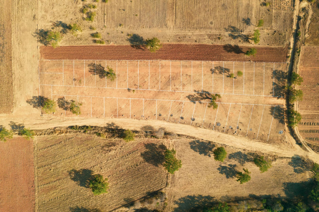 A collage of prime properties for sale in Nairobi, featuring land, houses, and investment opportunities.
